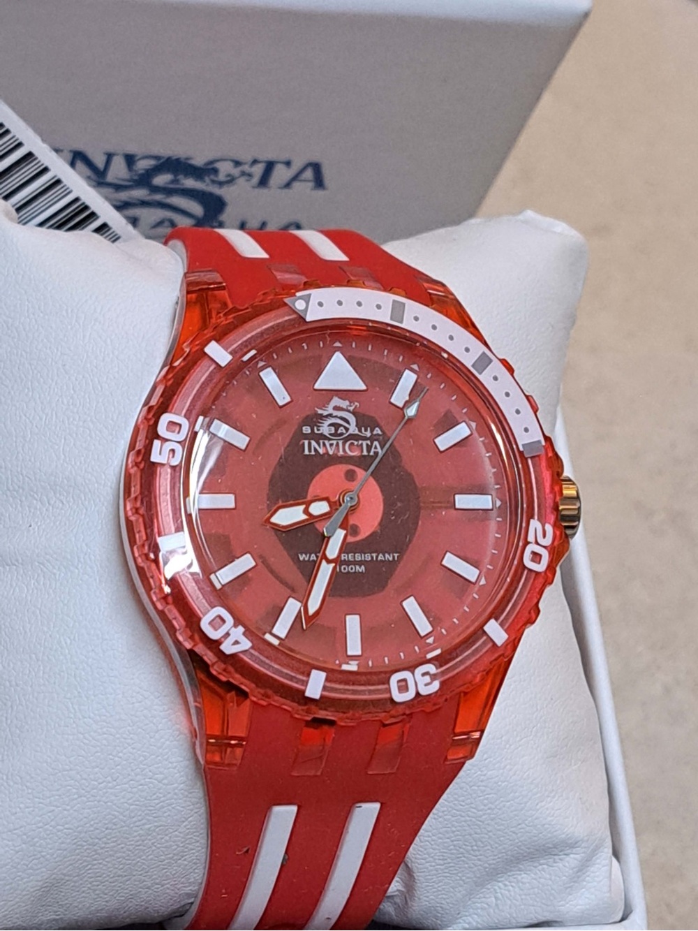 Invicta Subaqua Model 69450 Watch with a vibrant red "jelly" translucent case